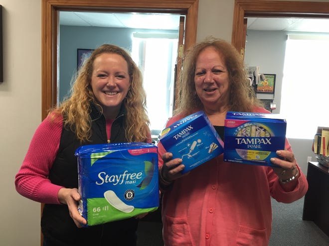 Jordan Latham, left, director of advocacy and support for YWCA Southeastern Massachusetts, and Wendy Garf-Lipp, executive director of United Neighbors of Fall River, have collaborated to bring awareness to "period poverty" and menstrual equity. [Deborah Allard]