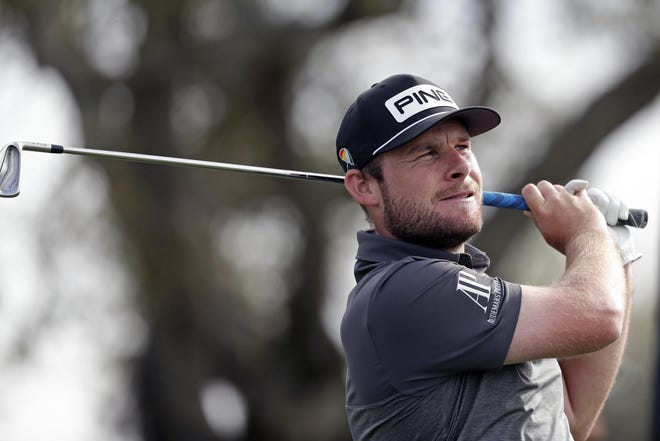 Tyrrell Hatton watches his shot from the seventh tee Friday during the second round of the Arnold Palmer Invitational in Orlando, Fla. [John Raoux/The Associated Press]