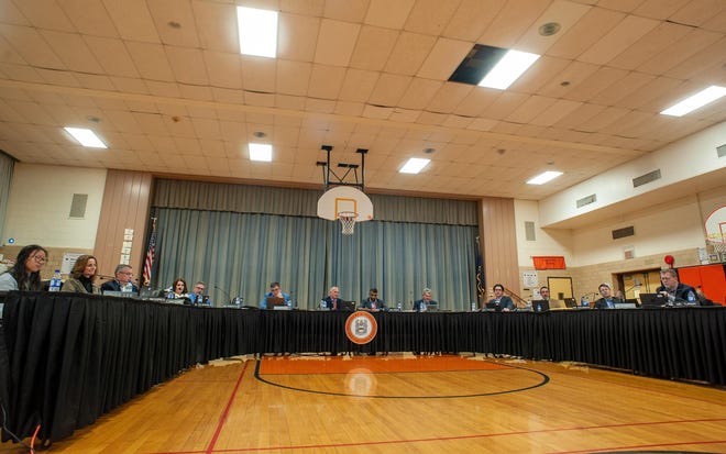Pennsbury School Board members at the start of the Pennsbury School Board Meeting Feb. 20, where they discussed allegations contained in a pair of federal lawsuits filed by former administrators. [WILLIAM THOMAS CAIN / PHOTOJOURNALIST]