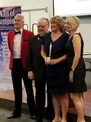 Award recipients pose together at the 20th West Michigan Lakeshore Association of Realtors on the Lakeshore celebration. [Contributed]