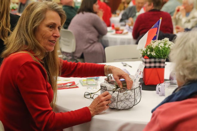 The Onslow County Cooperative Extension Agricultural Banquet was held Thursday evening at the Onslow County Government Center. The annual banquet celebrates Farmers and their accomplishments during the past year. [Tina Brooks / The Daily News]