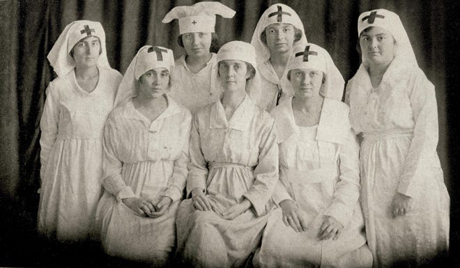 University of Texas women such as these volunteered to serve in the Red Cross during World War I. They became essential during the Spanish flu outbreak in 1918, when the epicenters for care were the UT campus, Camp Mabry, Seton Infirmary and the City Hospital, later known as Brackenridge. [Contributed by the Briscoe Center for American History]