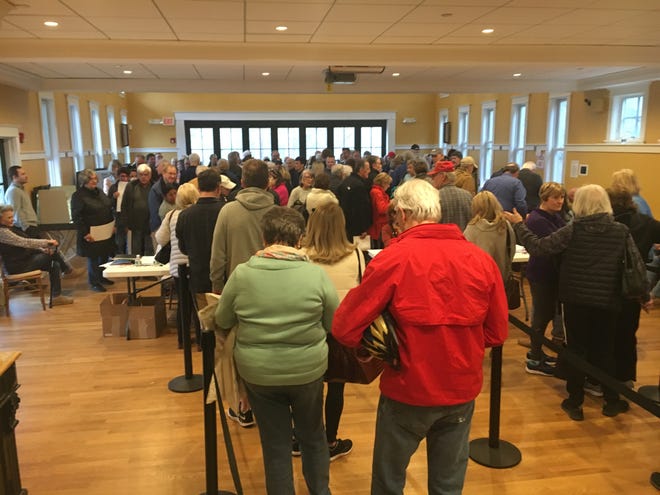 Voters reported waiting up to two hours to cast ballots in The Pinehills Tuesday. [Wicked Local photo/Rich Harbert]
