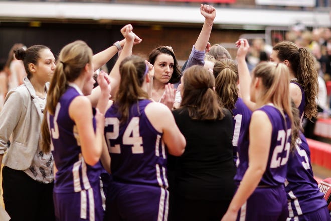 Blackstone Valley Tech coach Britt Kahler offers words of encouragement to her team in a timeout during the Div. 4 Central final at WPI on Saturday. The Beavers lost, 52-39. [Gannett Photo/Dylan Azari]
