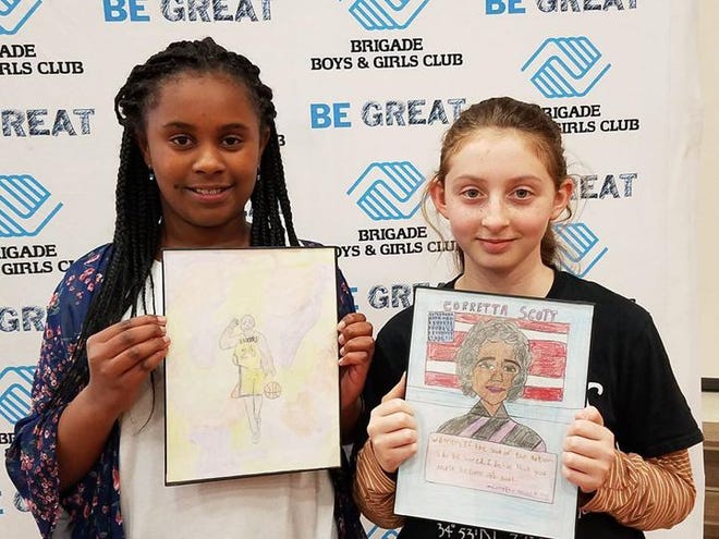 Braxton Johnson, left, and Summer Hasenflu were the top two winners in the Black History Month Art Competition held by U.S. Cellular in partnership with Brigade Boys & Girls Club. Johnson was the first-place winner in Onslow County, Hasenflu received second place and Emma Petsch, not pictured, took third place. [Jannette Pippin / The Daily News]