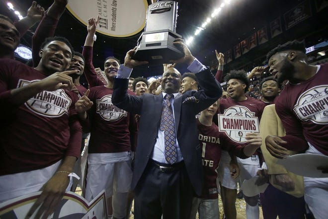 Florida State head coach Leonard Hamilton celebrates after winning the ACC regular season championship after defeating the Boston College Eagles at Donald L. Tucker Center on Saturday in Tallahassee. [Glenn Beil-USA TODAY Sports]