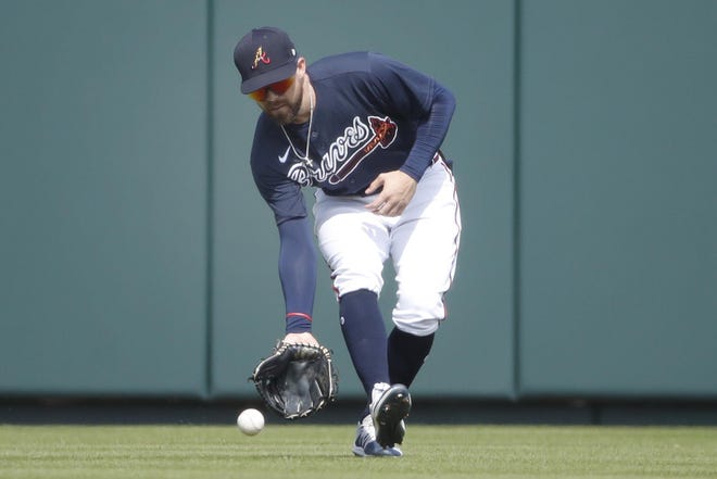 Atlanta Braves center fielder Ender Inciarte plays the ball during a spring training game against the Tampa Bay Rays on March 3 in Venice, Fla. [ELISE AMENDOLA/THE ASSOCIATED PRESS]