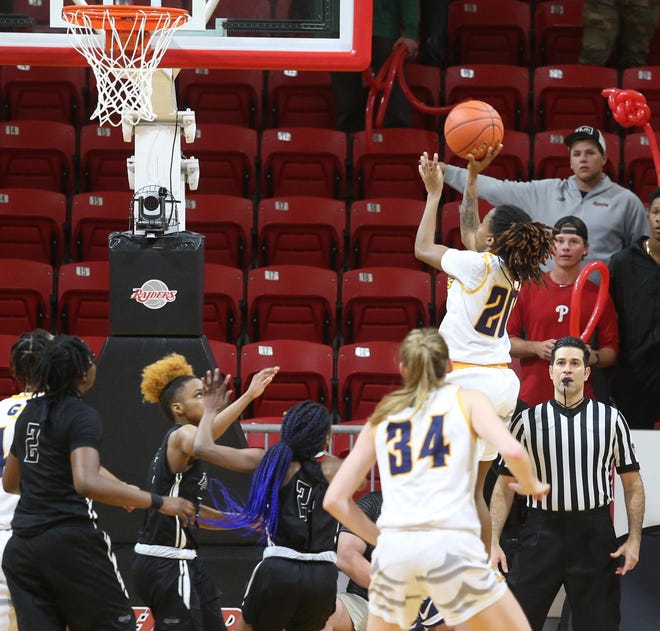 Gulf Coast State’s Ra”Shara Simmons hits the shot to send the FCSAA/NJCAA District VIII women’s championship basketball game into overtime against Northwest Florida State, Saturday, March 7, 2020, in Niceville. [MICHAEL SNYDER/DAILY NEWS]