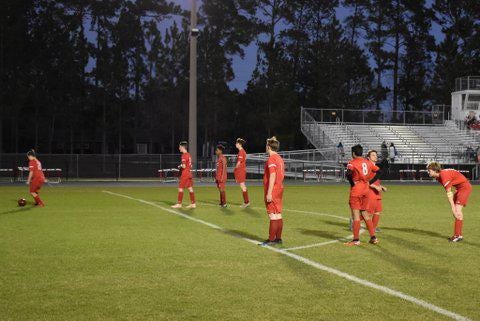 Bryan County soccer team warms up for a match. [Mike Brown/For Bryan County Now]