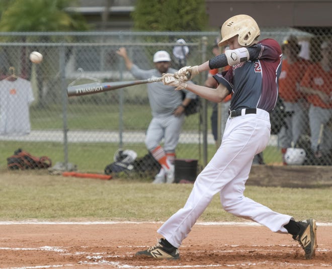 Real Life Christian Academy’s Noah Clymer (2) gets a hit during Tuesday’s game against Mount Dora High School at Bishop Field in Clermont. [PAUL RYAN / CORRESPONDENT]