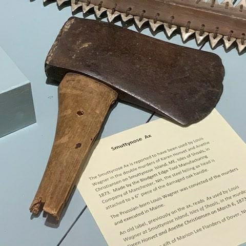 "This ax is said to be the weapon used by Lewis Wagner in the double murders of Karen and Anethe Christiansen on Smutty Nose Island, the Isles of Shoals, on March 6, 1873," reads the label. [Courtesy photo by James Smith/Portsmouth Athenaeum]