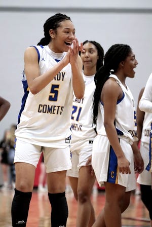 Classen's Darianna Littlepage-Buggs celebrates after the Comets defeated Newcastle 53-34 in the Area 3 Class A girls basketball tournament. [Steve Sisney/For The Oklahoman]