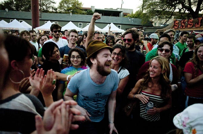 Cave Singers' Pete Quirk walks through the audience during their performance at the South by San Jose day party during the SXSW music festival in 2011. [AMERICAN-STATESMAN STAFF]