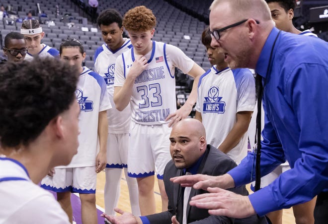 Brookside Christian coaches talk to the team during a timeout in the CIF Sac-Joaquin Section Division V Championship at Golden 1 Center Friday on Feb. 28. [SARA NEVIS/FOR THE STOCKTON RECORD]