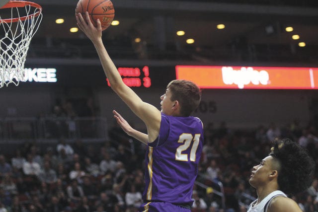 Waukee’s Pryce Sandfort going for the layup against Ankeny Centennial during the state semifinal battle Thursday, March 12. PHOTO BY ANDREW BROWN/DALLAS COUNTY NEWS