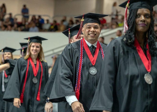 Northwest Florida State College graduates are shown during a recent ceremony. The college has about 400 students eligible to participate in Florida’s Last Mile Completion Program, which provides funding to help them finish their degrees. [CONTRIBUTED PHOTO]
