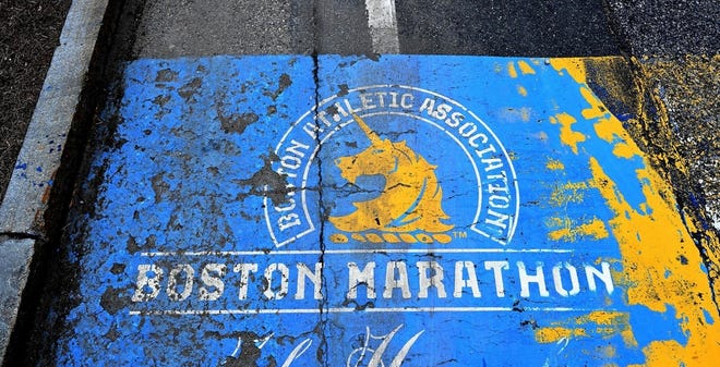 The well-worn Boston Marathon starting line in Hopkinton, as seen on Thursday, will likely not get a fresh coat of paint for months as officials have announced the race has been postponed from April 20 to Sept. 14 due to concerns about COVID-19. [Daily News and Wicked Local Staff Photo/Ken McGagh]