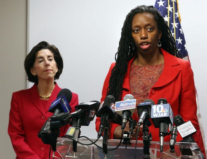 Health Director Nicole Alexander-Scott speaks as Gov. Gina Raimondo looks on during Friday&rsquo;s press briefng. On Saturday, it was announced that six new cases of coronavirus have been confirmed. [THE PROVIDENCE JOURNAL PHOTO]