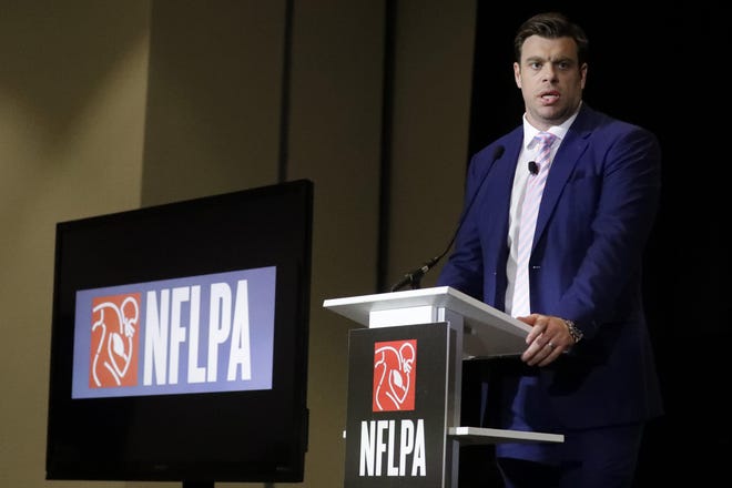 The gains the players make in sharing "a bigger portion of the growing pie" swayed the vote, according to outgoing NFLPA President Eric Winston, seen at the annual state of the NFLPA press conference in January. [Chris Carlson/The Associated Press]