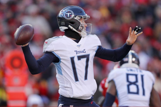 Ryan Tannehill, shown throwing a ball during the first half of the AFC Championship game against the Kansas City Chiefs on Jan. 19, 2020, in Kansas City, MO, agreed to a contract extension with the Tennessee Titans on Sunday. [AP File Photo/Jeff Roberson]