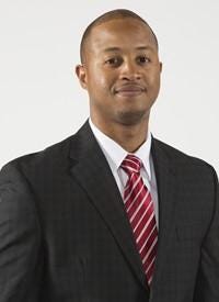 Takayo Siddle is a 2009 Gardner-Webb University graduate who is in his first season as a N.C. State basketball assistant. [NCSU athletics photo]