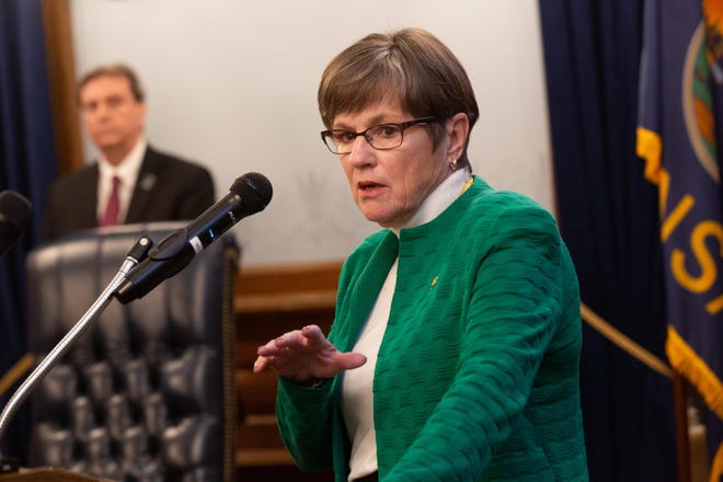 Gov. Laura Kelly announces the closing of public schools for the remainder of the school year during a news conference Tuesday at the Statehouse. A task force is looking at ways to provide alternative instruction to students, as well as child care and delivery of meals. [Evert Nelson/The Capital-Journal]