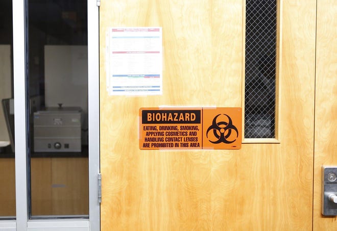 A door entrance of a laboratory where potential cases of the coronavirus will be tested at the Florida Department of Health Laboratory in Tampa, Florida on March 2, 2020.