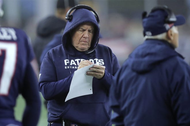 Patriots head coach and GM Bill Belichick now must focus on working his magic to figure out a way to create more cap room. [AP File Photo/Charles Krupa]