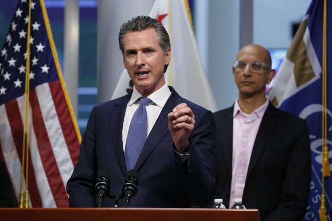 In this March 17, 2020 file photo, California Gov. Gavin Newsom gives an update to the state's response to the coronavirus at the Governor's Office of Emergency Services in Rancho Cordova. [RICH PEDRONCELLI/THE ASSOCIATED PRESS/FILE)