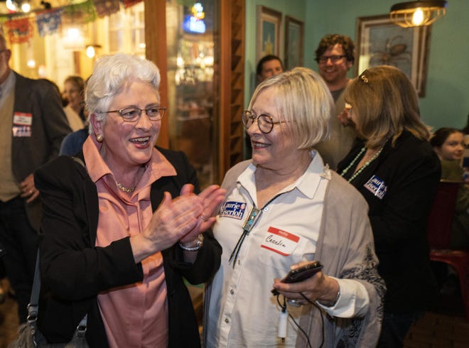 Laurie Eiserloh, left, a Democratic candidate for Travis County attorney, is welcomed by campaign treasurer Cecelia Burke as she arrives at her campaign watch party March 3 in Austin. Eiserloh advanced to the runoff with 42.2% of the vote. [RODOLFO GONZALEZ/FOR STATESMAN]