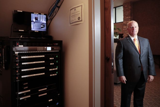 Michael Schoedinger, president of Schoedinger Funeral Homes, poses for a portrait outside the home's live-streaming control room on Aug.12, 2019, at Schoedinger Funeral Home in Upper Arlington, Ohio. Over the past decade, funeral homes have begun using the technology that allows for services to be livestreamed online for anyone with a password to see. To limit spread of the coronavirus, funeral directors, including those in Rockford, anticipate more livestreaming of services. [JOSHUA A. BICKEL/USA TODAY NETWORK]