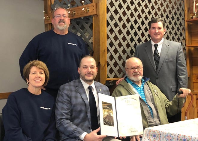 Reps. Jonathan Fritz (R-Susquehanna/Wayne) and Mike Peifer (R-Pike/Wayne) presented a citation to Watson Brothers in recognition of 52 years in business. Seated left to right: Michelle (Watson) McConnell, Rep. Fritz, James Watson, Jimmy Watson and Rep. Peifer. [Contributed Photo]
