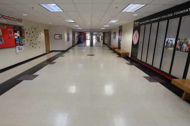 The empty halls of Southeastern Community College are shown March 13 on the West Burlington campus. In response to the coronavirus pandemic SCC is moving it face-to-face classes online for the remainder of the semester. [John Lovretta/thehawkeye.com]