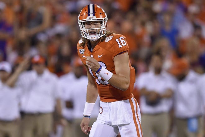 The NCAA said Tuesday that Clemson quarterback Trevor Lawrence and girlfriend Melissa Mowry can resume their fundraising efforts after Clemson officials had shut down their gofundme.com page — “Covid-19 Family Relief and Support" — for fear the quarterback was committing a violation. [Richard Shiro/The Associated Press]