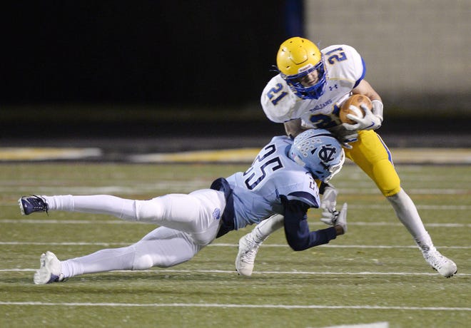 Central Valley's Stephon Hall brings down Derry's Justin Huss during a WPIAL Class 3A semifinal game at North Allegheny High School. [Sally Maxson/BCT File]