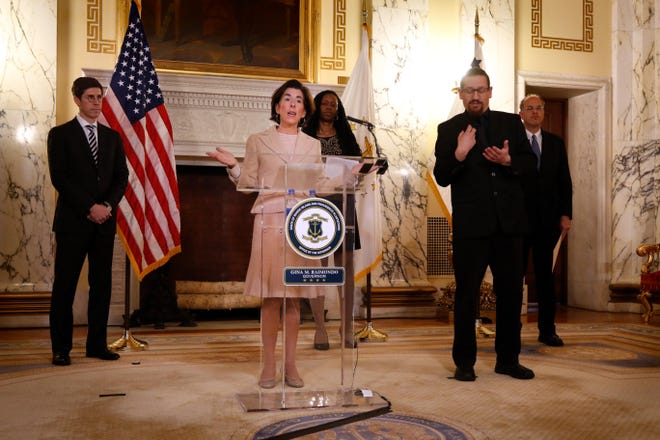 Governor Gina Raimondo provides an update on the state’s efforts to combat the coronavirus at the R.I. Statehouse on Wednesday afternoon. [KRIS CRAIG/THE PROVIDENCE JOURNAL]