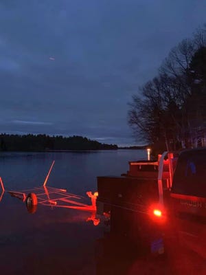 The Ashland Fire Department launched a boat for a possible rescue Tuesday night at the Ashland Reservoir. [Courtesy Photo/Ashland Fire Department]