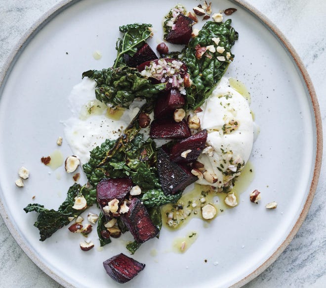 Roasted root vegetables are marinated along with kale and then lightly charred and served on burrata or mozzarella for this dish from “Cooking for Good Times.” [Contributed by Peden+Munk]