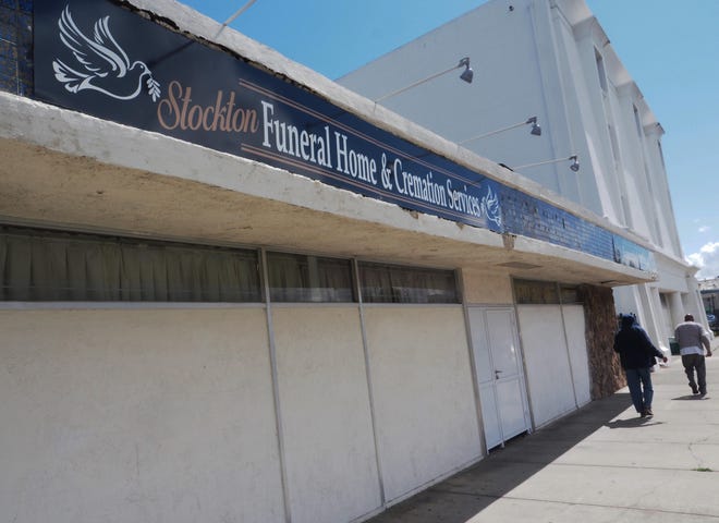 To follow state mandates, Stockton Funeral Home and Cremation Services, located on North California Street, is “trying to push everything online through email or fax,” according to counselor Jose Ayala. “Any families looking to hire our services, we are looking to meet only with the immediate person to make arrangements and narrowing it down to just one person.” [CALIXTRO ROMIAS/THE STOCKTON RECORD]