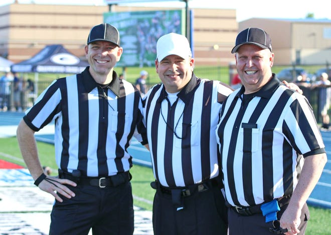 Officials Mike Durham, from left, Danny Robins and Cecil Hood prior to a spring football game in Greenwood in May 2018. [Submitted Photo Peggy Barger]
