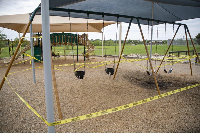 Avalon Rinderknecht Park in Pflugerville was closed Saturday as part of the effort to curb the spread of the coronavirus. Austin parks officials took similar action and announced Saturday that park amenities, excluding restrooms and water fountains, would be closed. [RICARDO B. BRAZZIELL/AMERICAN-STATESMAN]