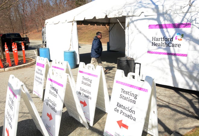 Drive-through tents are set up on March 18 for coronavirus testing at The William W. Backus Hospital in Norwich, Connecticut. [John Shishmanian/ NorwichBulletin.com]