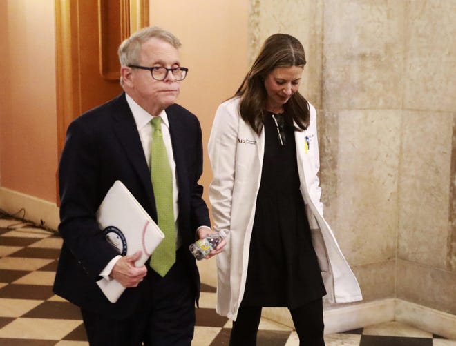 Ohio Gov. Mike DeWine and Department of Health Director Dr. Amy Acton called on the pharmacy board to stop doctors from improper off-label prescriptions for a drug that might be effective in treating the coronavirus. (DISPATCH/DORAL CHENOWETH III)