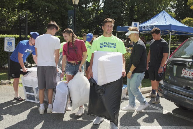 First year students moved into their dorms at Salve Regina University with the help of upper classmen in September. Students were being allowed to return to campus to retrieve their belongings this week, while off-campus residents are returning to their housing. [Newport Daily News / Peter Silvia]
