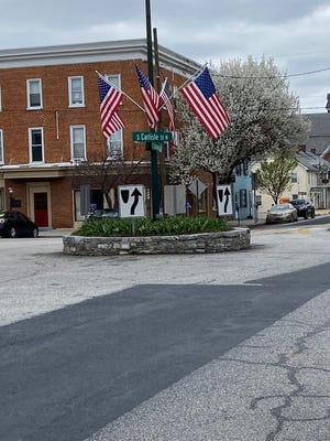 American flags are flying and the Bradford pear trees are blooming in downtown Greencastle. SHAWN HARDY/ECHO PILOT