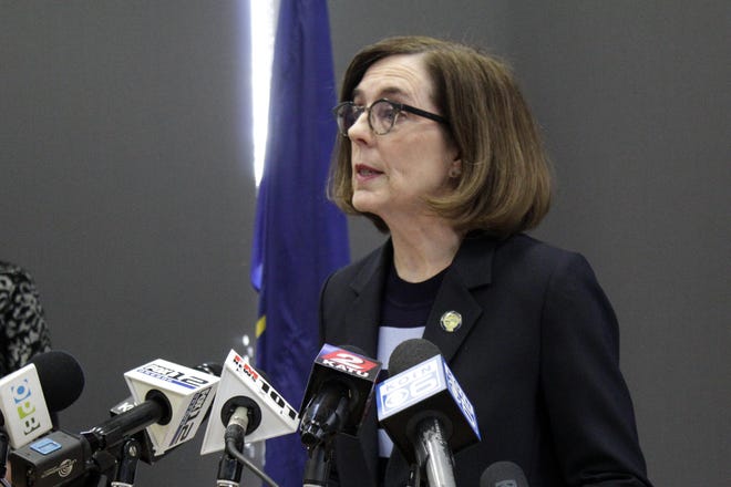 Gov. Kate Brown speaks at a news conference March 16, 2020, in Portland. (AP Photo/Gillian Flaccus)