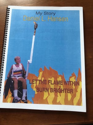 Dan Hansen’s picture is on the cover of his book. (Photo submitted by Lee Elliott)