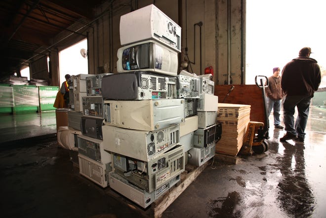 Old computers and discarded electronic items arrive for disassembly at the e-Recycling of California processing facility located at 7230 Petterson Lane in Paramount. e-Recycling of California handles some of the millions of pounds of e-waste that are generated in the greater L.A. area. (Al Seib / Los Angeles Times/TNS)