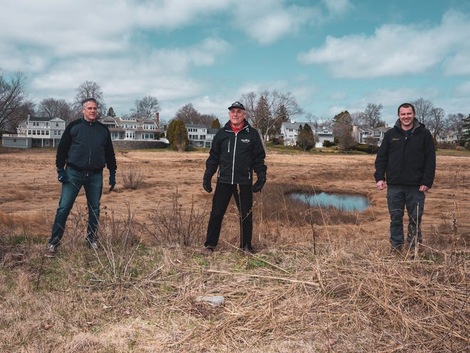 (L-R) Jeffrey Doherty, president of Goldthwait Reservations' Board of Trustees, Tyler Ferrick, environmental scientist with Derosa Environmental Consulting, and Geoffrey Lubbock, treasurer of the Board of Trustees, are all helpng to bring marsh life back to Goldthwait Marsh. Tuesday, March 31, 2019. [Wicked Local Photo / Jared Charney]