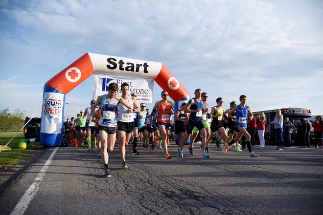 Competitors begin their run in the 2017 Run for the Red. 2020’s marathon and half marathon has been postponed to 2021 due to the COVID-19 pandemic. [POCONO RECORD FILE PHOTO]